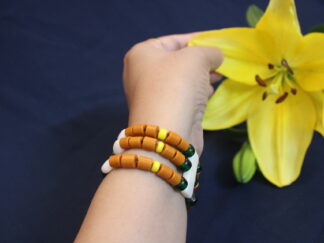 Trendy Traditional Bracelet, small orangish chamthei | Egg-shape white beads, Green and orange tube, 3 lines bracelet