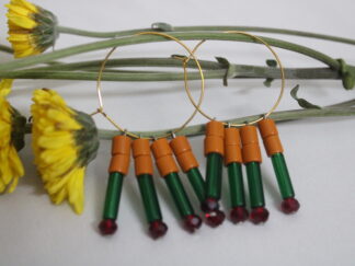 Stylish Round hanging earring with small brown and long green pipes | four strings and red octagon beads