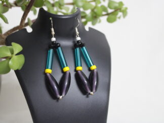 Modern earring diamond shape joint design with black octagon beads, long green pipe and small yellow beads between | two big purple chamtheis