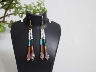 Luxe earring with seven small white beads, green and brown pipes | two strings and two pink crystals