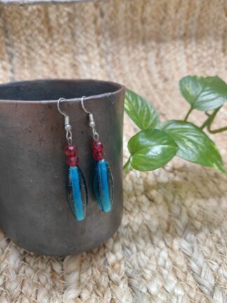 Modern earring with big turquoise beads with two small red beads
