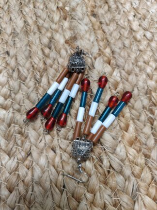 Silver Jhumka earring mixed with traditional style, four strings with brown, white and green tubes and red chamthei
