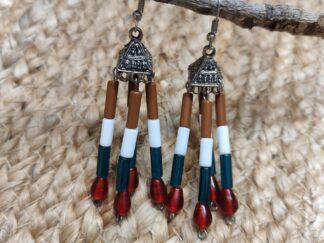 Silver Jhumka earring mixed with traditional style, four strings with brown, white and green tubes, finished with red beads